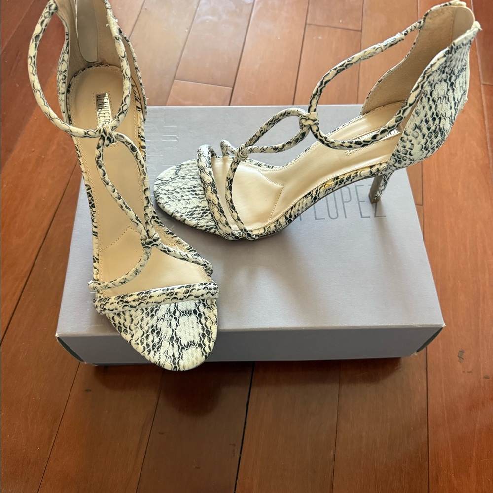 Jennifer Lopez Black and Cream Snake Print Heels